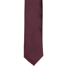 Load image into Gallery viewer, The front of a wine skinny tie, laid flat