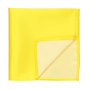 A yellow pocket square with a corner flipped up
