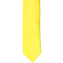 Load image into Gallery viewer, The front of a yellow skinny tie, laid out flat