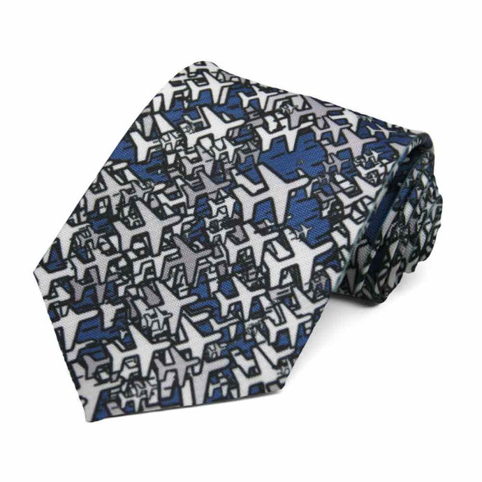 A tie with scattered airplanes on a dark blue background.