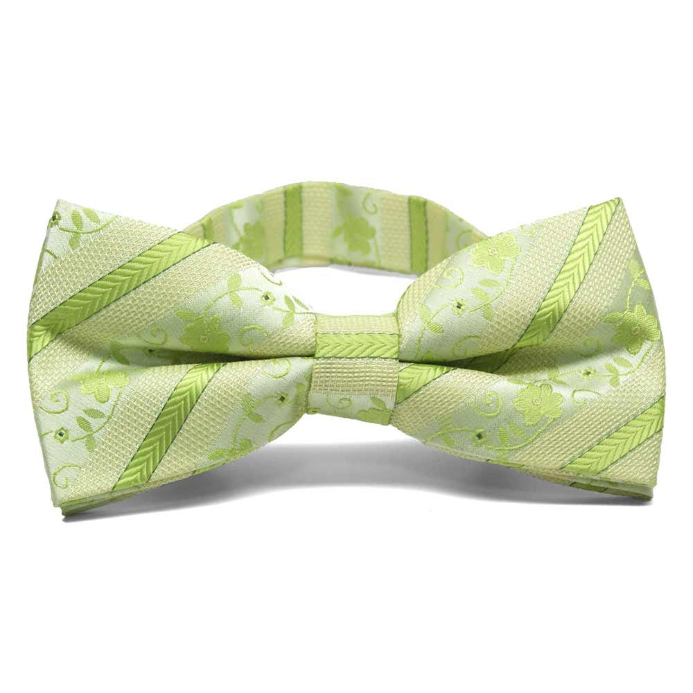 Front view of a bright green floral stripe bow tie