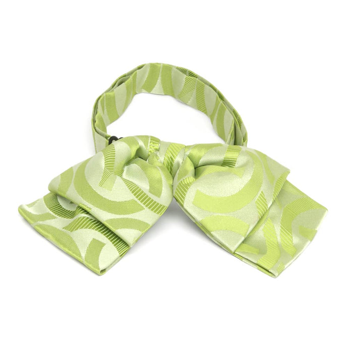 Bright green link pattern floppy bow tie, front view