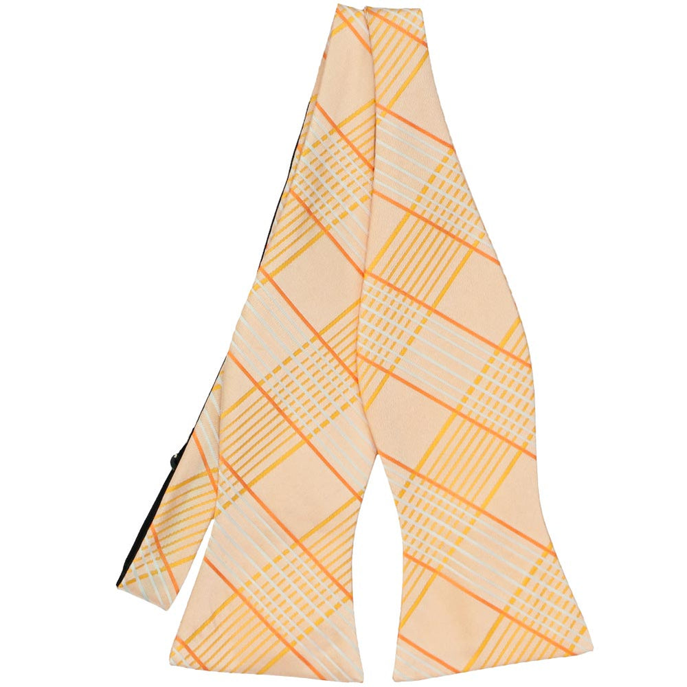 Light orange plaid self-tie bow tie, untied front view