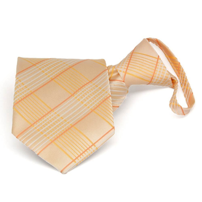 Folded front view of a light orange plaid zipper tie