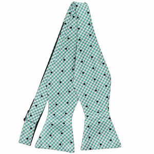 An aquamarine and black gingham self-tie bow tie, untied