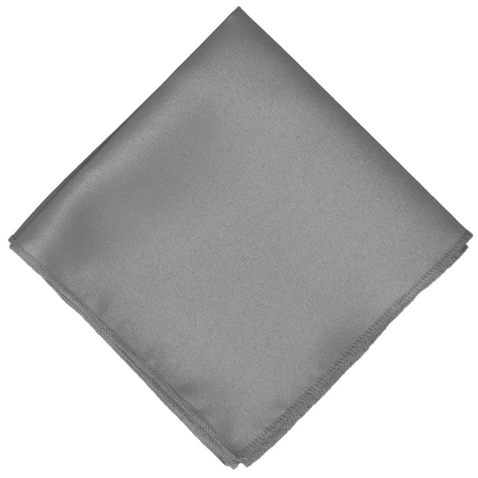 Armor gray pocket square folded into a diamond shape