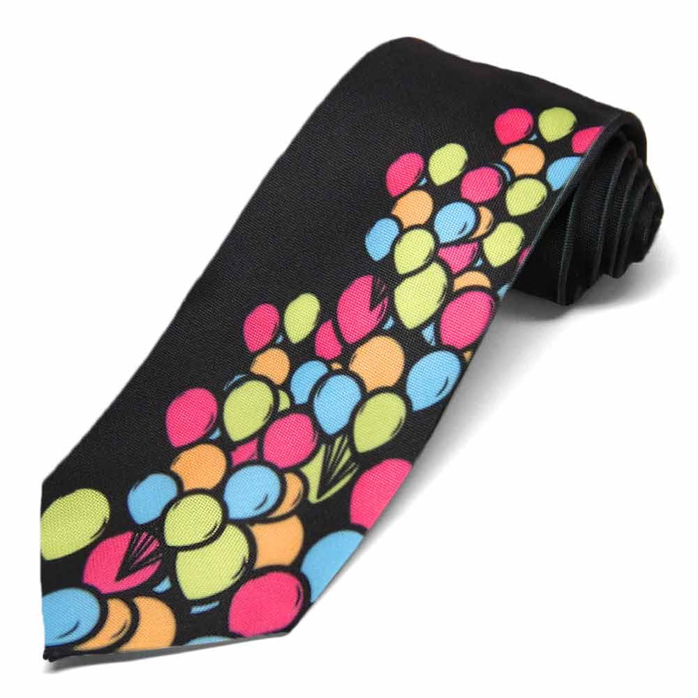 Colorful balloons scattered on a men's black novelty tie