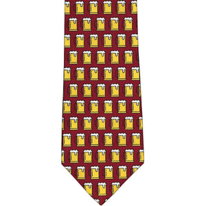 The front of a maroon tie with yellow beer mugs 