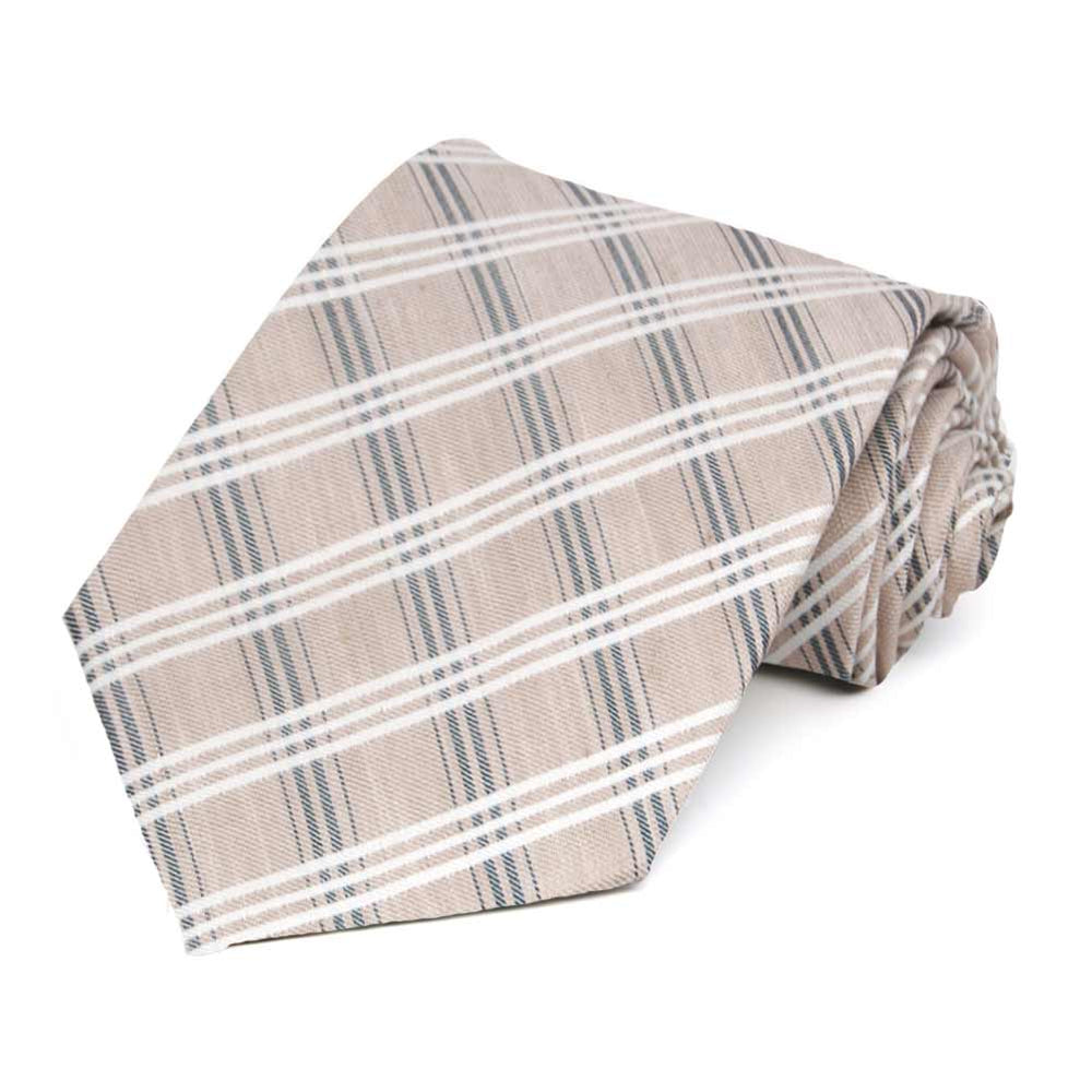 A beige white and gray plaid necktie rolled to show the pattern