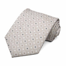 Load image into Gallery viewer, Beige necktie rolled to show the white and tan square geometric pattern