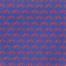 Load image into Gallery viewer, Zoomed in image of a blue pocket square with red bicycles printed on it.