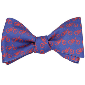A blue and red bicycle self-tie bow tie, tied