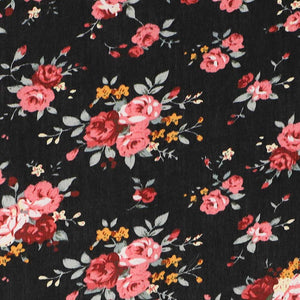 Coral and black floral fabric