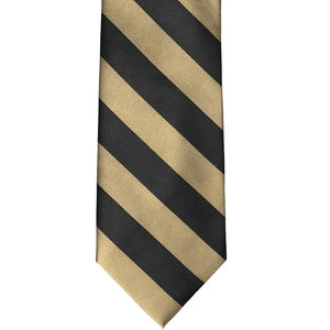 The front of a champagne and black striped tie, laid out flat