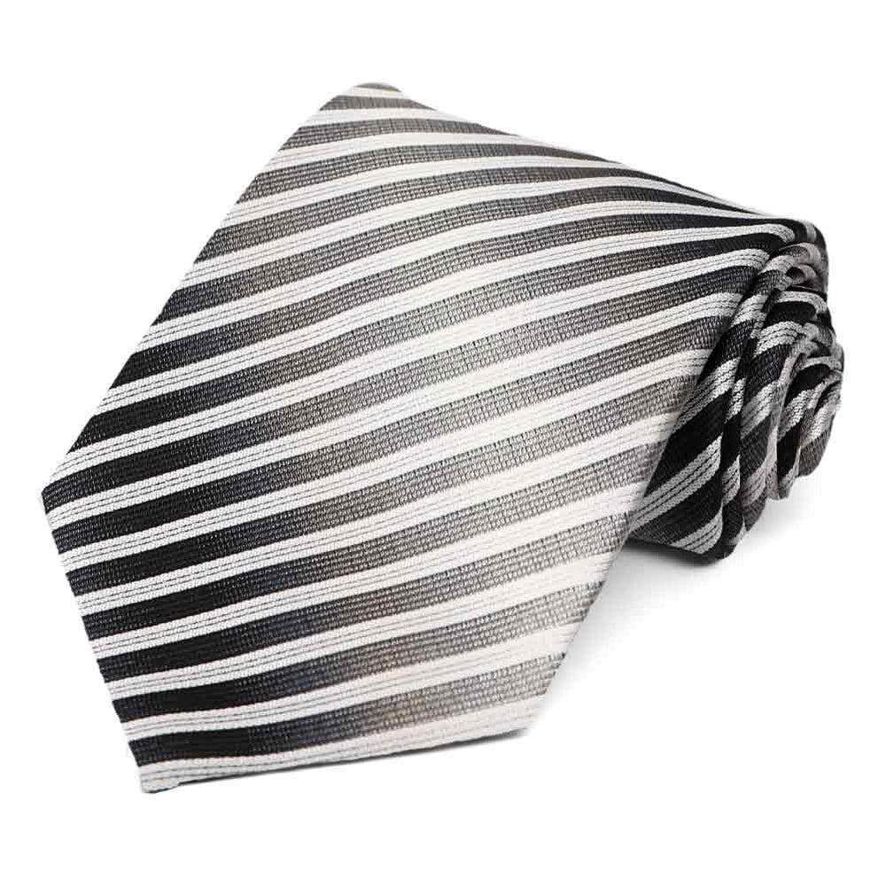 Black and gray striped necktie, rolled