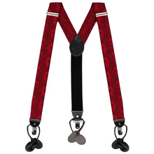 Load image into Gallery viewer, Red suspenders with a black paisley design, laid flat and displayed in an M shape