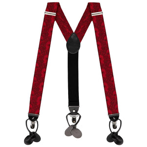 Red suspenders with a black paisley design, laid flat and displayed in an M shape