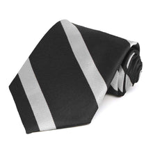 Load image into Gallery viewer, Black and silver striped necktie rolled to show the texture of the silver stripes