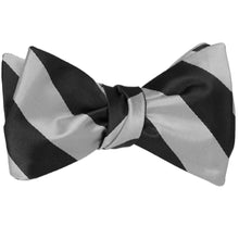 Load image into Gallery viewer, Black and silver striped self-tie bow tie, tied