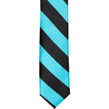 Load image into Gallery viewer, The front tip of a black and turquoise striped skinny tie, laid out flat