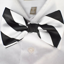 Load image into Gallery viewer, A black and white striped bow tie paired with a white dress shirt