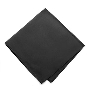 A folded solid black pocket square