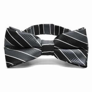 Front view of a black, gray and white striped bow tie