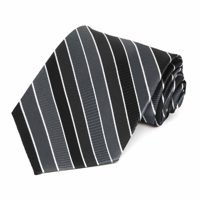 Rolled view of a black, gray and white striped extra long necktie