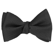 Load image into Gallery viewer, Black herringbone self-tie bow tie, tied
