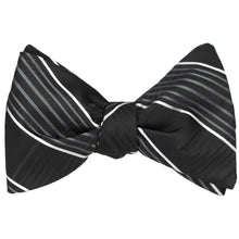 Load image into Gallery viewer, A tied self-tie bow tie in a black plaid pattern