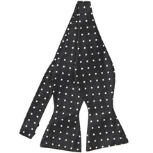 Load image into Gallery viewer, An untied black and white polka dot bow tie