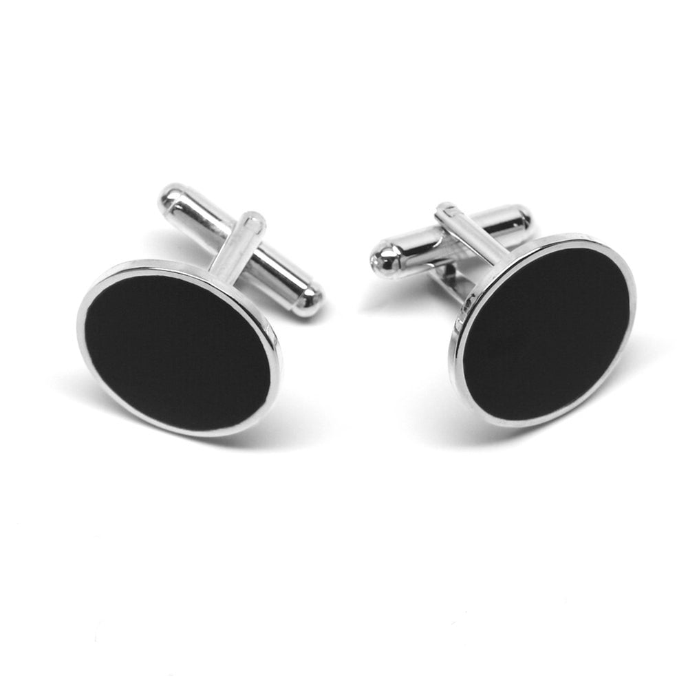 Silver background cufflinks with a round black face.