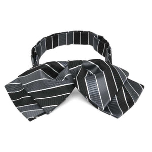 Front view of a black, gray and white striped floppy bow tie