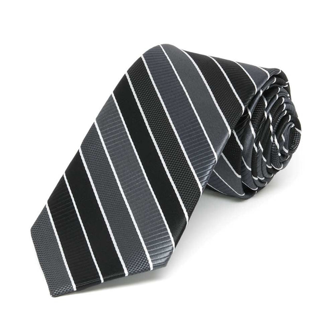 Rolled view of a black, gray and white striped slim necktie