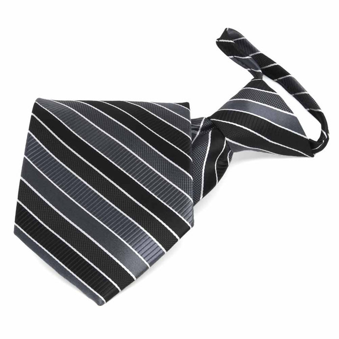 Front folded view of a black, gray and white striped zipper style tie
