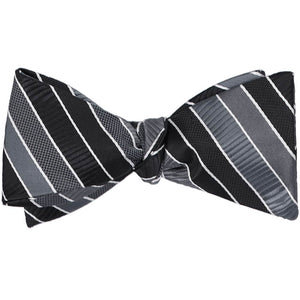 A black striped self-tie bow tie, tied