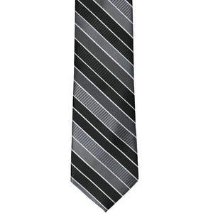 The front of a black striped slim tie