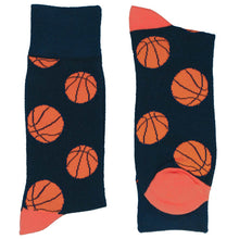 Load image into Gallery viewer, A folded pair of blue and orange basketball socks