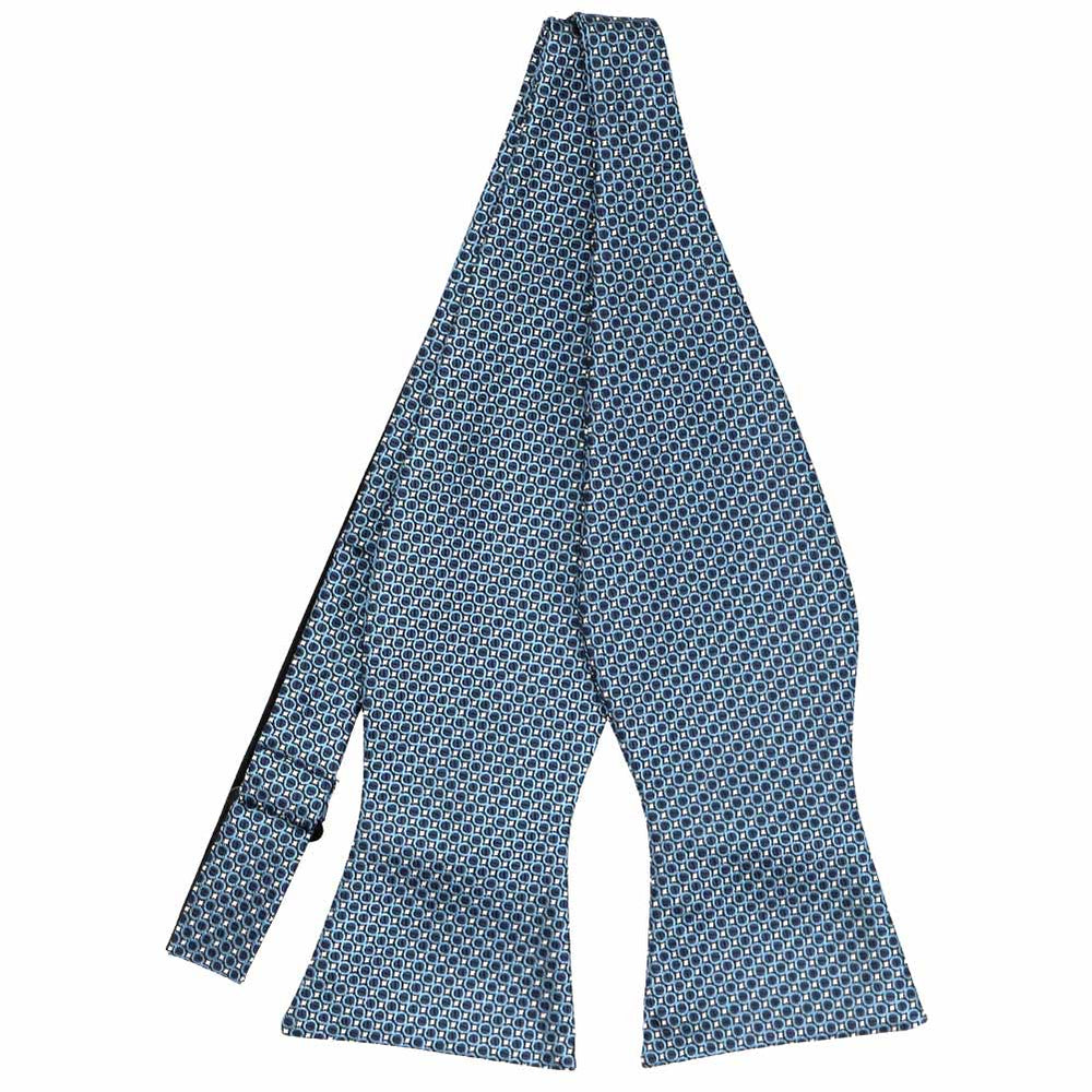 Dark blue circle pattern self-tie bow tie, untied flat front view