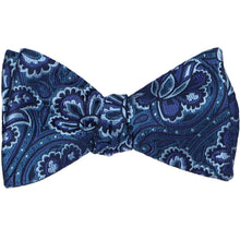Load image into Gallery viewer, A tied self-tie bow tie in a blue floral silk pattern