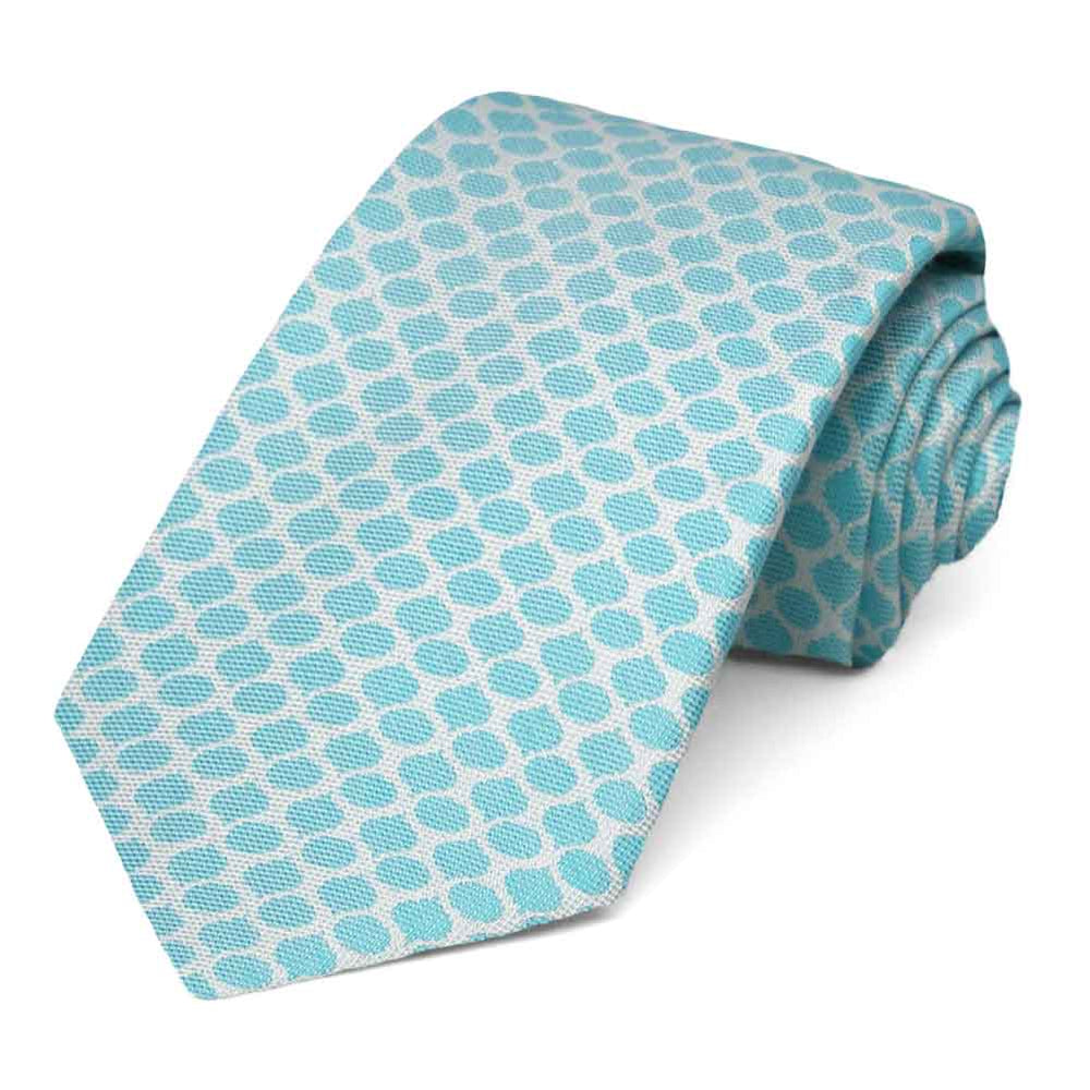 Turquoise and white water pattern necktie, rolled to show woven texture