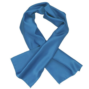A solid blue scarf, crossed over itself