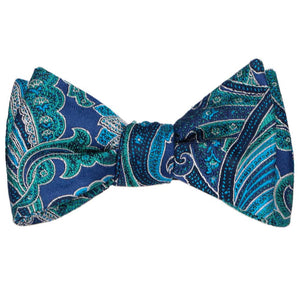 A jewel-toned tied paisley self-tie bow tie