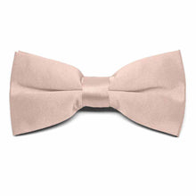 Load image into Gallery viewer, The front of a blush pink clip-on bow tie