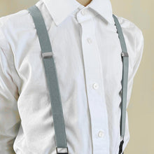 Load image into Gallery viewer, A boy wearing cadet gray suspenders with a white dress shirt