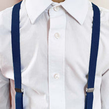 Load image into Gallery viewer, Boy wearing dark blue suspenders with a white dress shirt