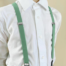 Load image into Gallery viewer, A boy wearing seafoam suspenders with a white dress shirt