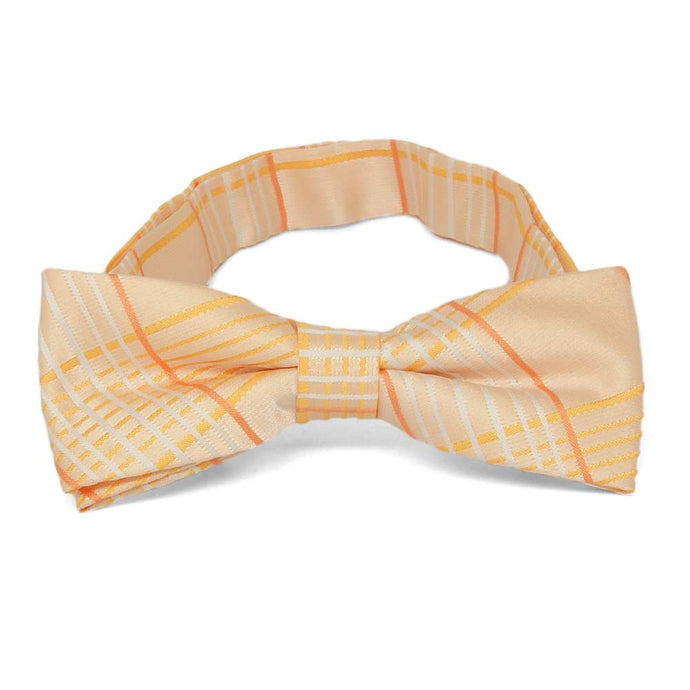 Boys' light orange plaid bow tie, close up view