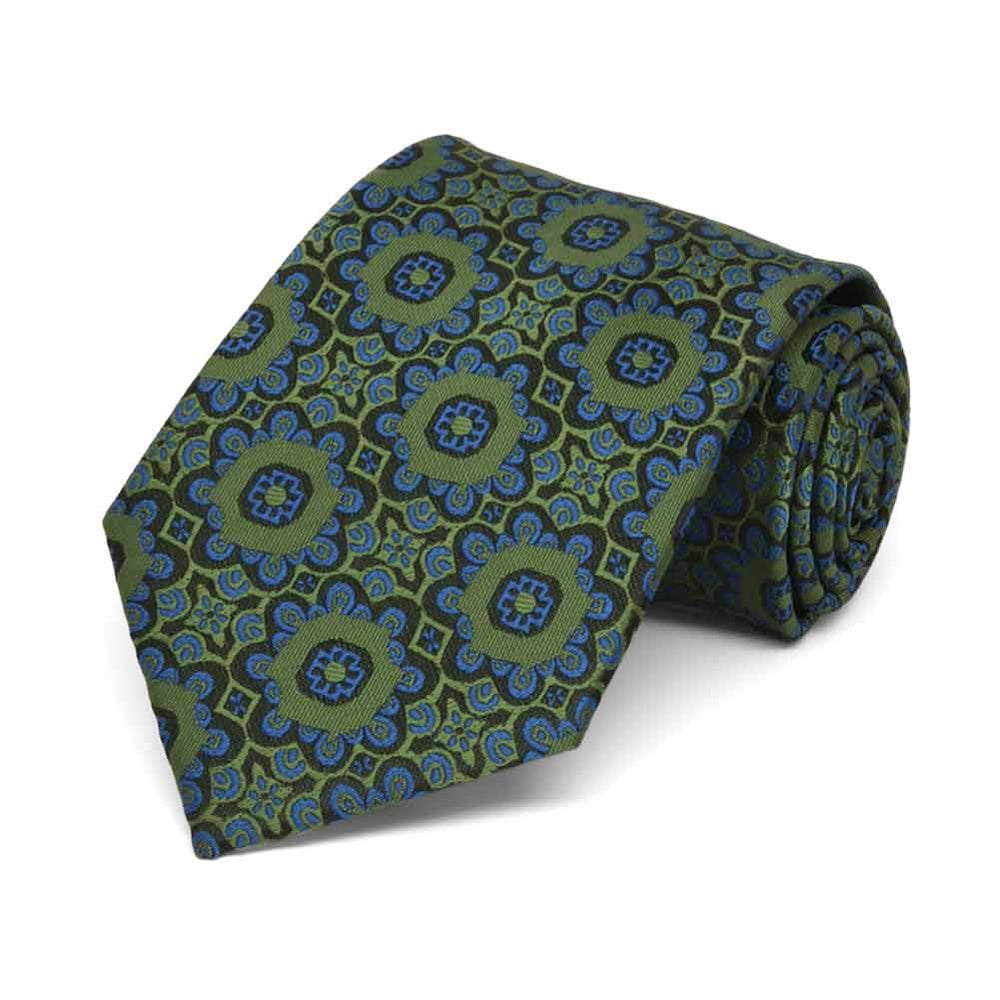 Rolled view of a green and blue floral pattern boys' necktie