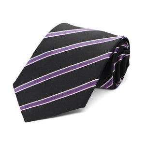 Boys' black and purple striped necktie, rolled to show texture